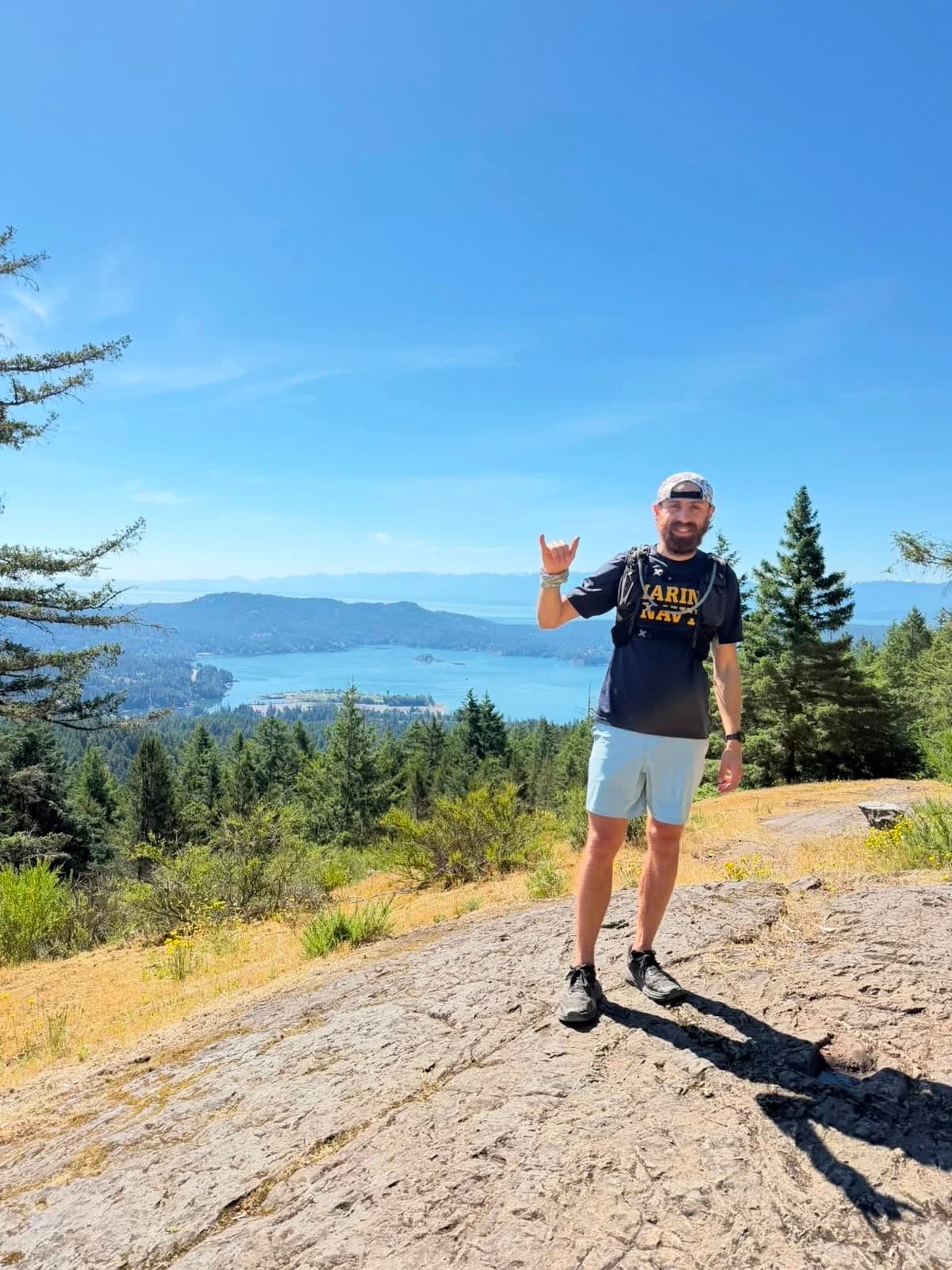 Manuel at a viewpoint over the water on Vancouver Island